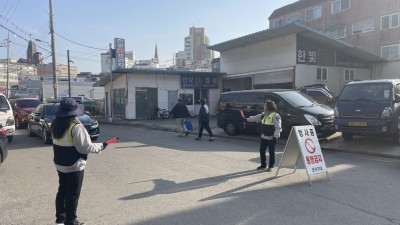 군자동 자율방범대, 설 연휴 교통 봉사 펼쳐